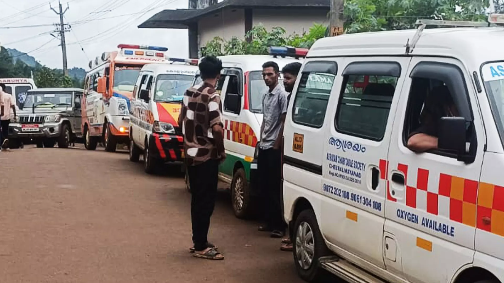 Ambulances of various organisations waiting in a queue in Wayanad.