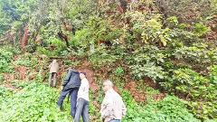 Archaeologists at the Navaluti Cave in the dense forests of Sanduru taluk in Bellary district.