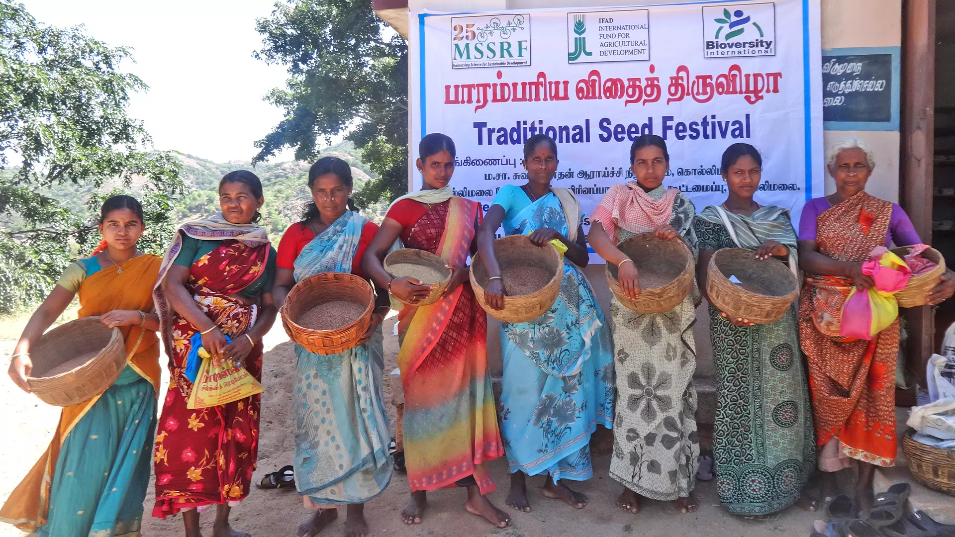 Women participating in seed festival. 