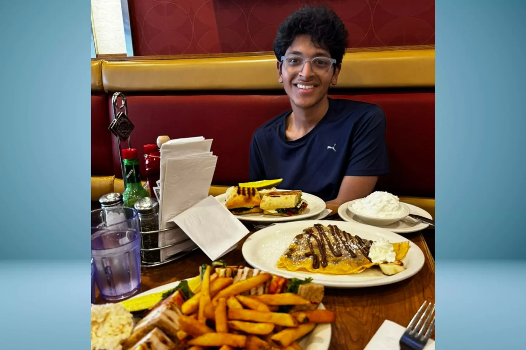 Indian YouTuber Ishan Sharma at a restaurant in New York, USA