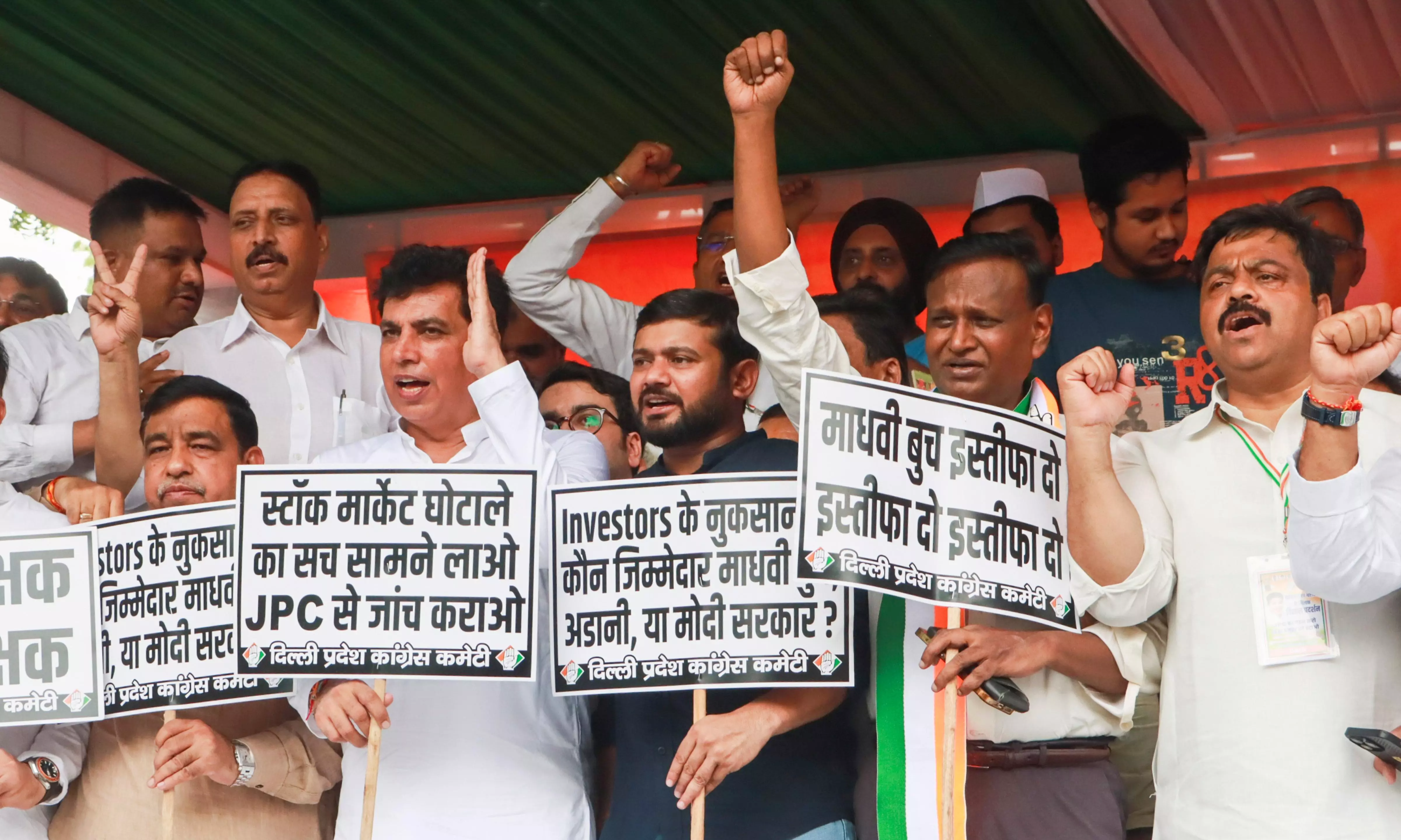 Cong protests, demands SEBI chiefs resignation and JPC probe into Adani issue