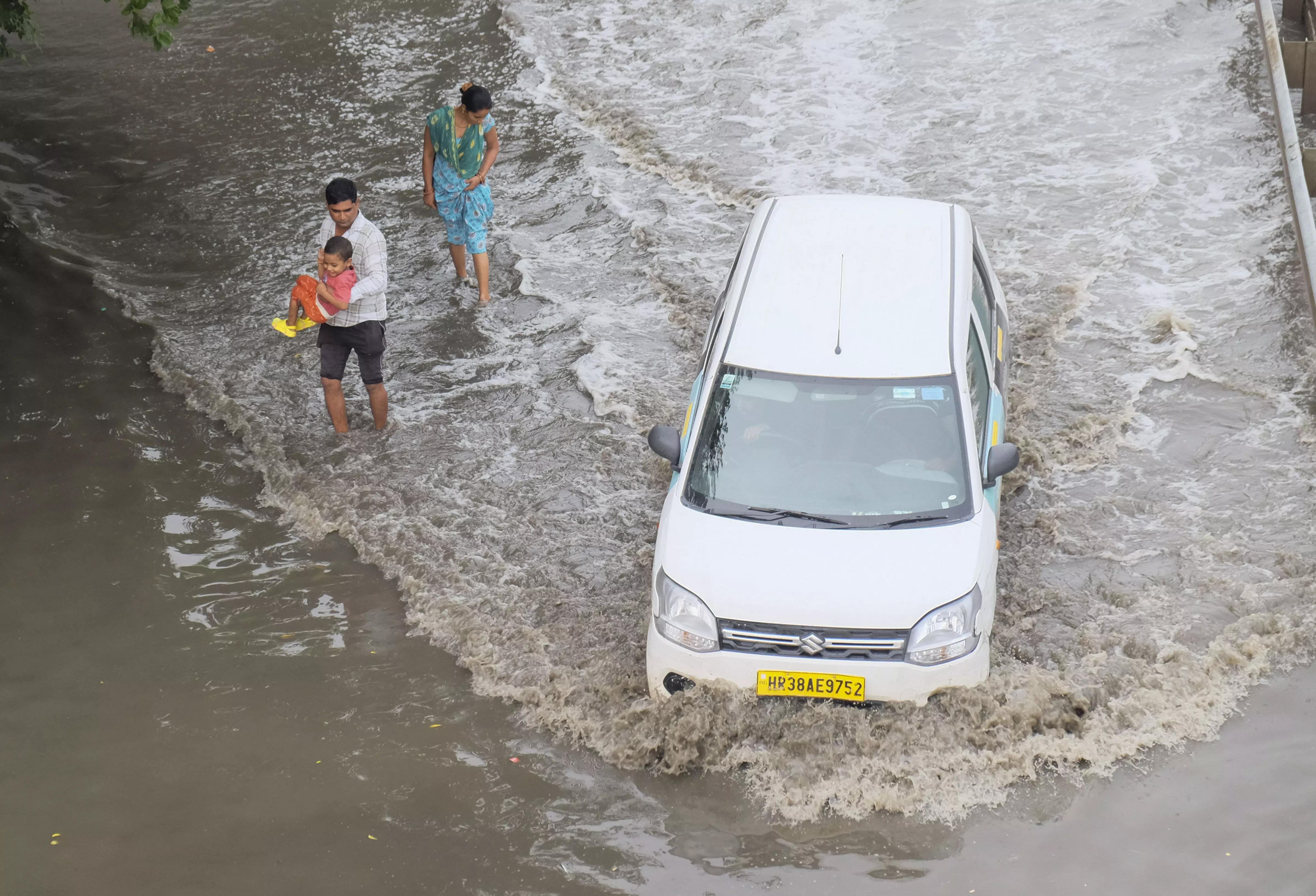 Schools shut, hundreds evacuated as rains lash Gujarat; IMD issues red alert