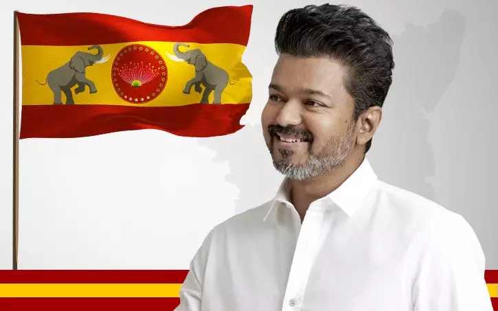 Tamil film actor Vijay with his party TVKs flag