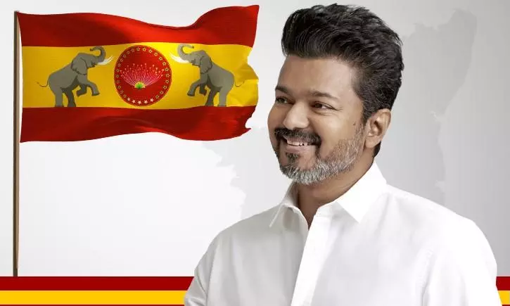 Tamil film actor Vijay with his party TVKs flag