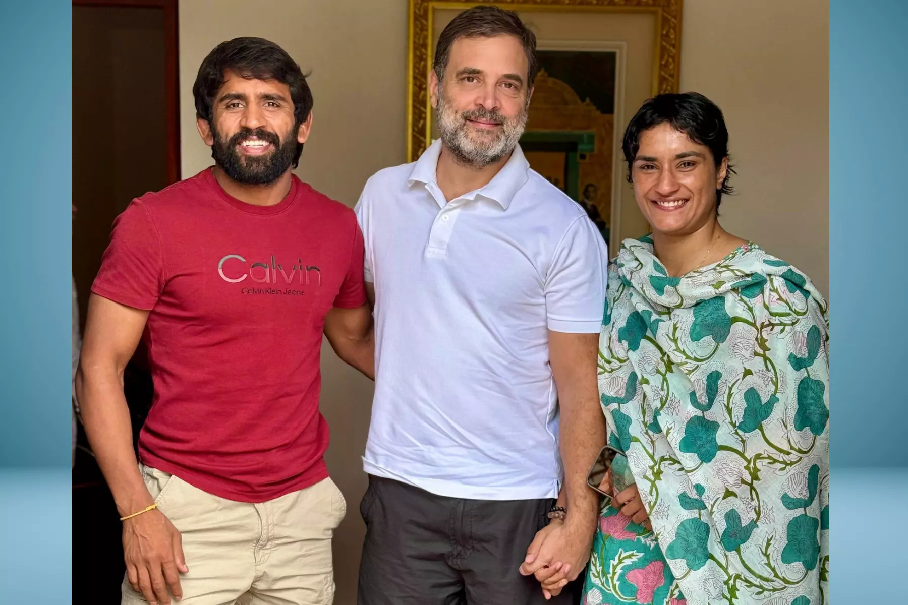 Leader of Opposition in Lok Sabha Rahul Gandhi with wrestlers Bajrang Punia (left) and Vinesh Phogat