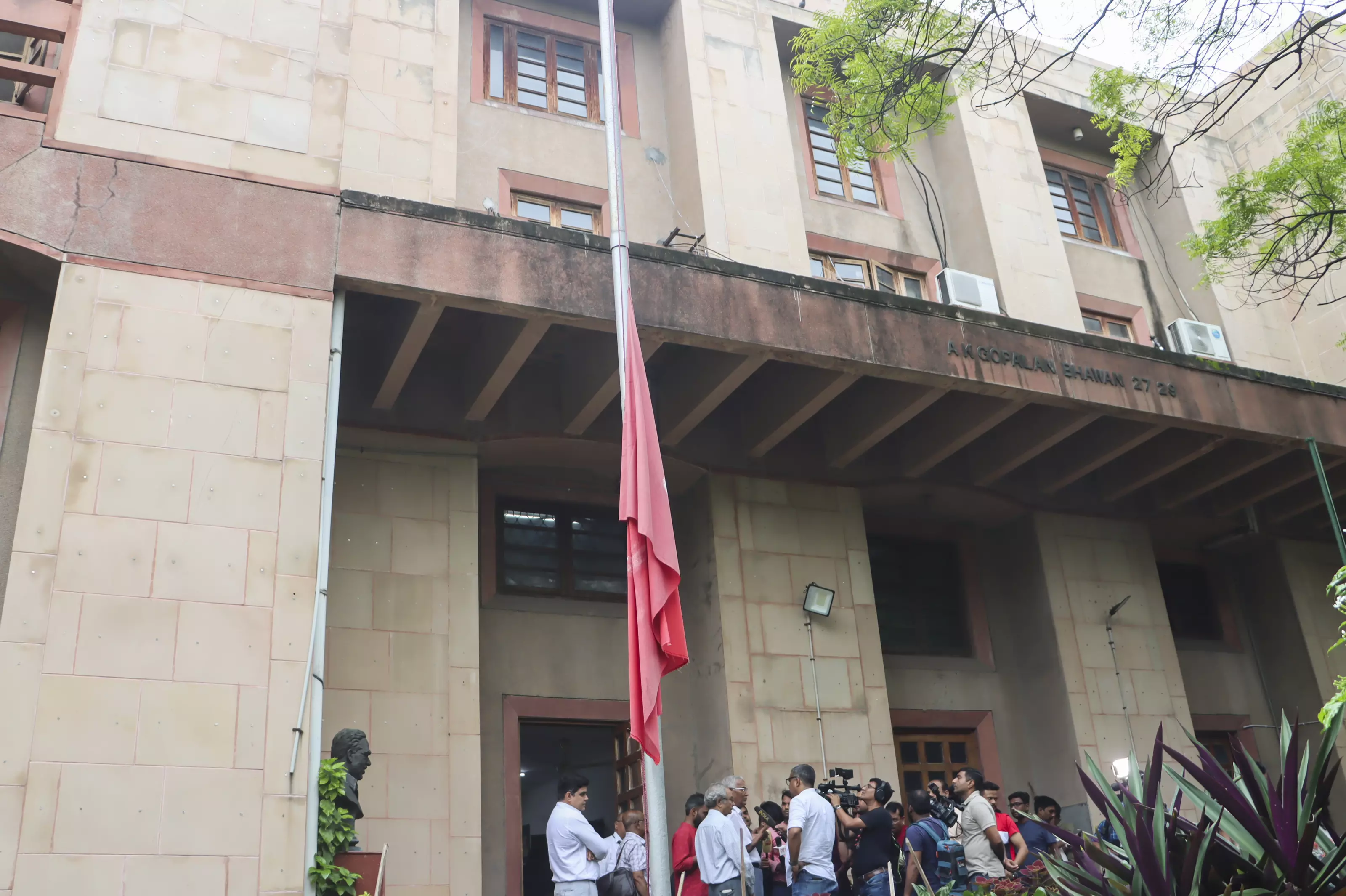 CPI(M)s party flag flies at half-mast following the demise of the partys general secretary Sitaram Yechury, at the party office in New Delhi. 