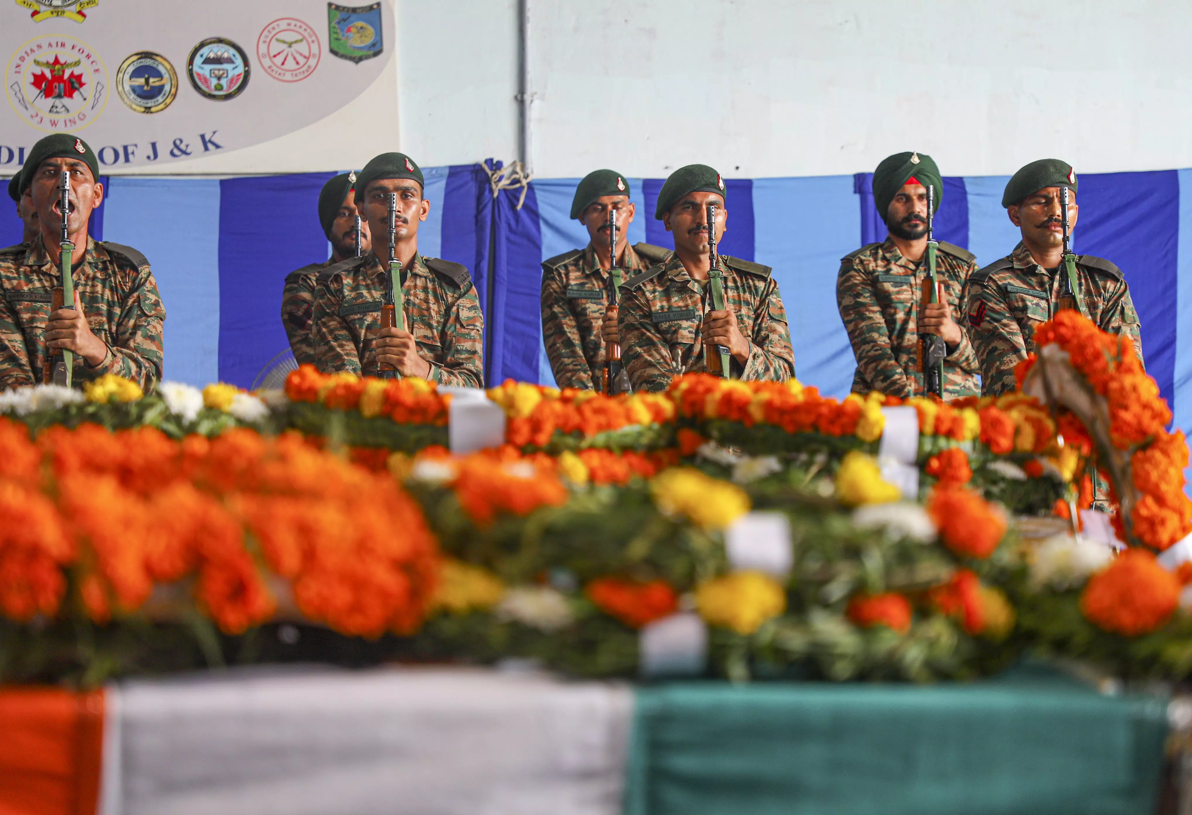 Soldiers pay tribute to two Army personnel who were killed in an encounter with terrorists in Kishtwar district of J&K