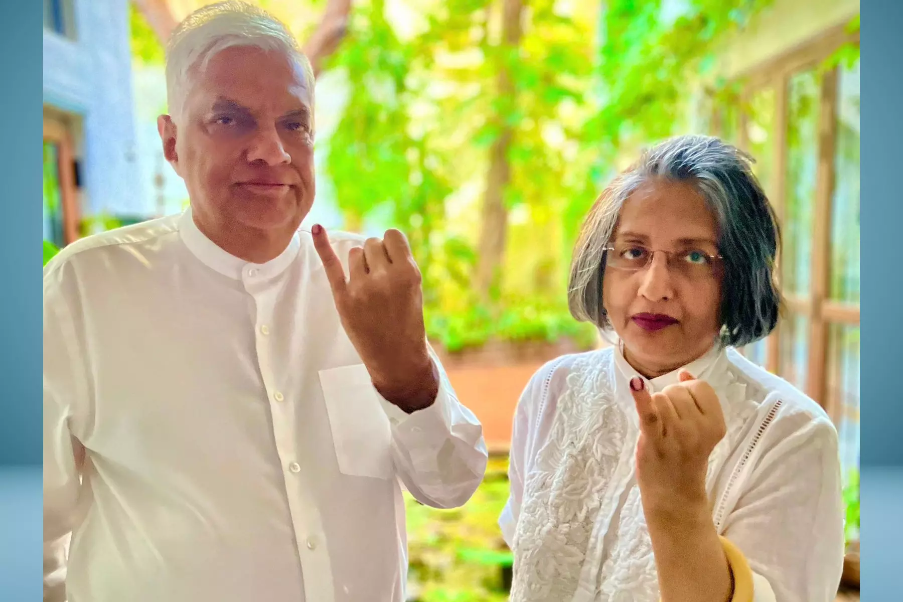 Sri Lanka President Ranil Wickremesinghe (left) and his wife Maithree Wickramasinghe