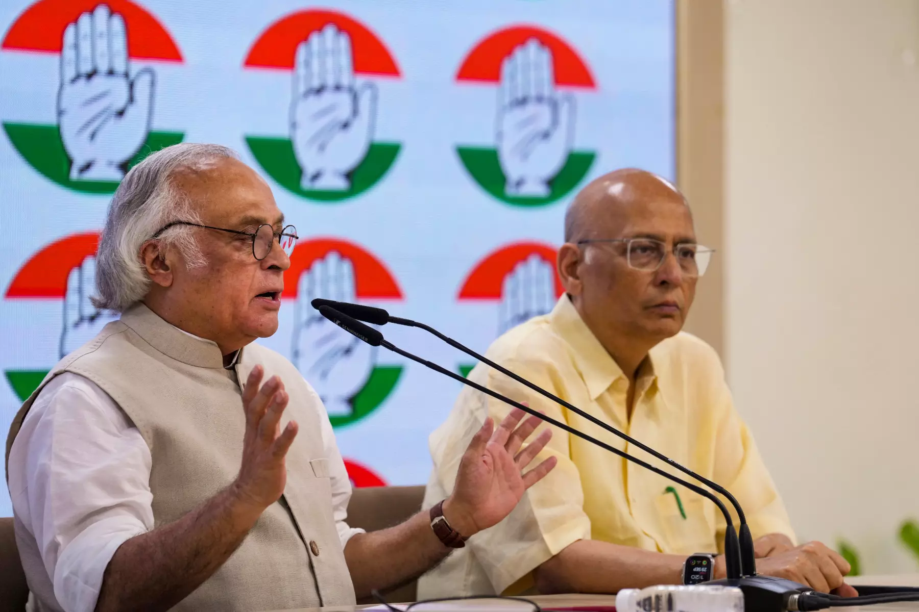 Congress general secretary in-charge communications Jairam Ramesh (left) and AICC spokesperson Abhishek Singhvi