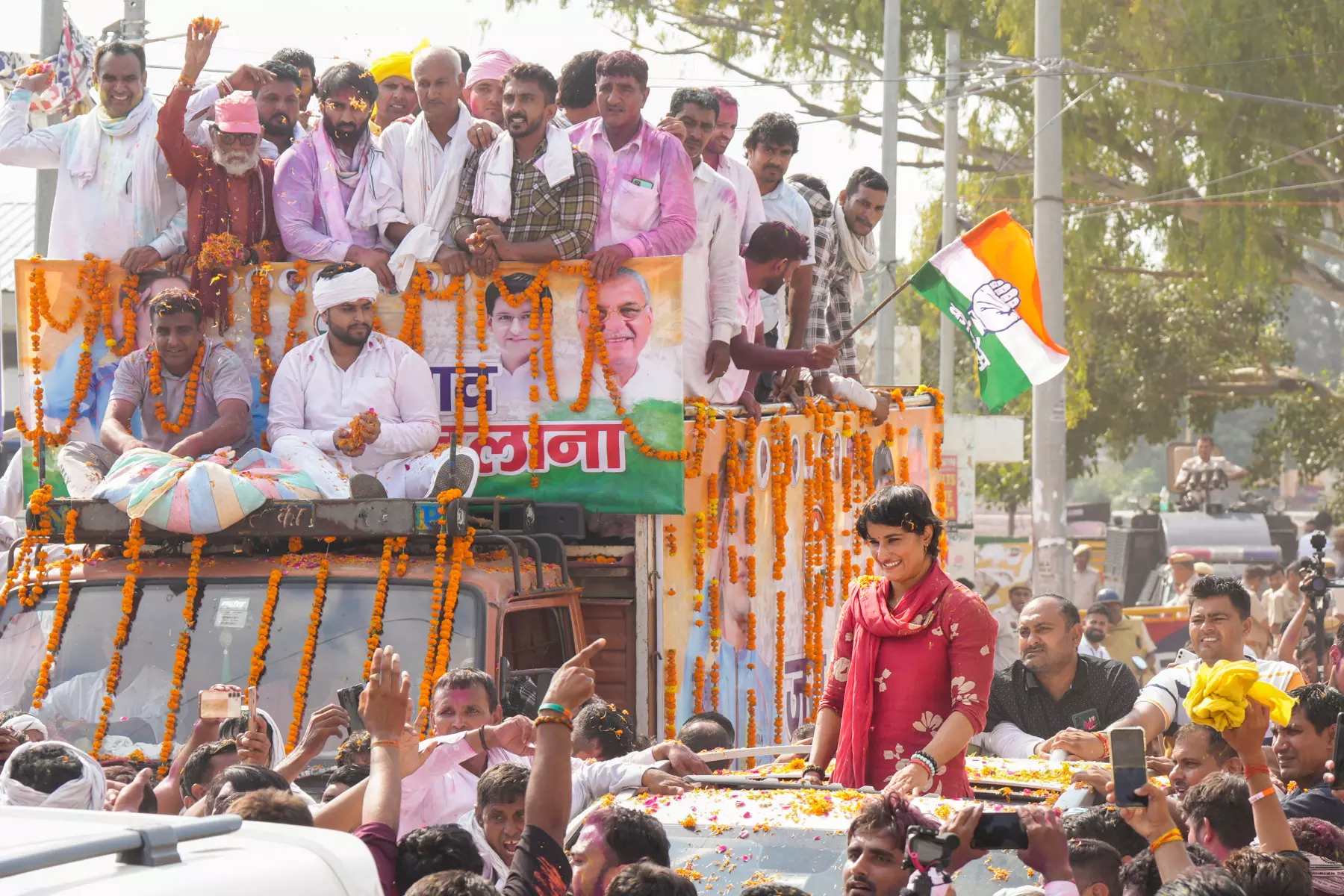 Congress candidate Vinesh Phogat greets supporters during her victory celebration after winning from Julana constituency in the Haryana Assembly elections, in Jind district, Haryana, Tuesday, October 8. PTI