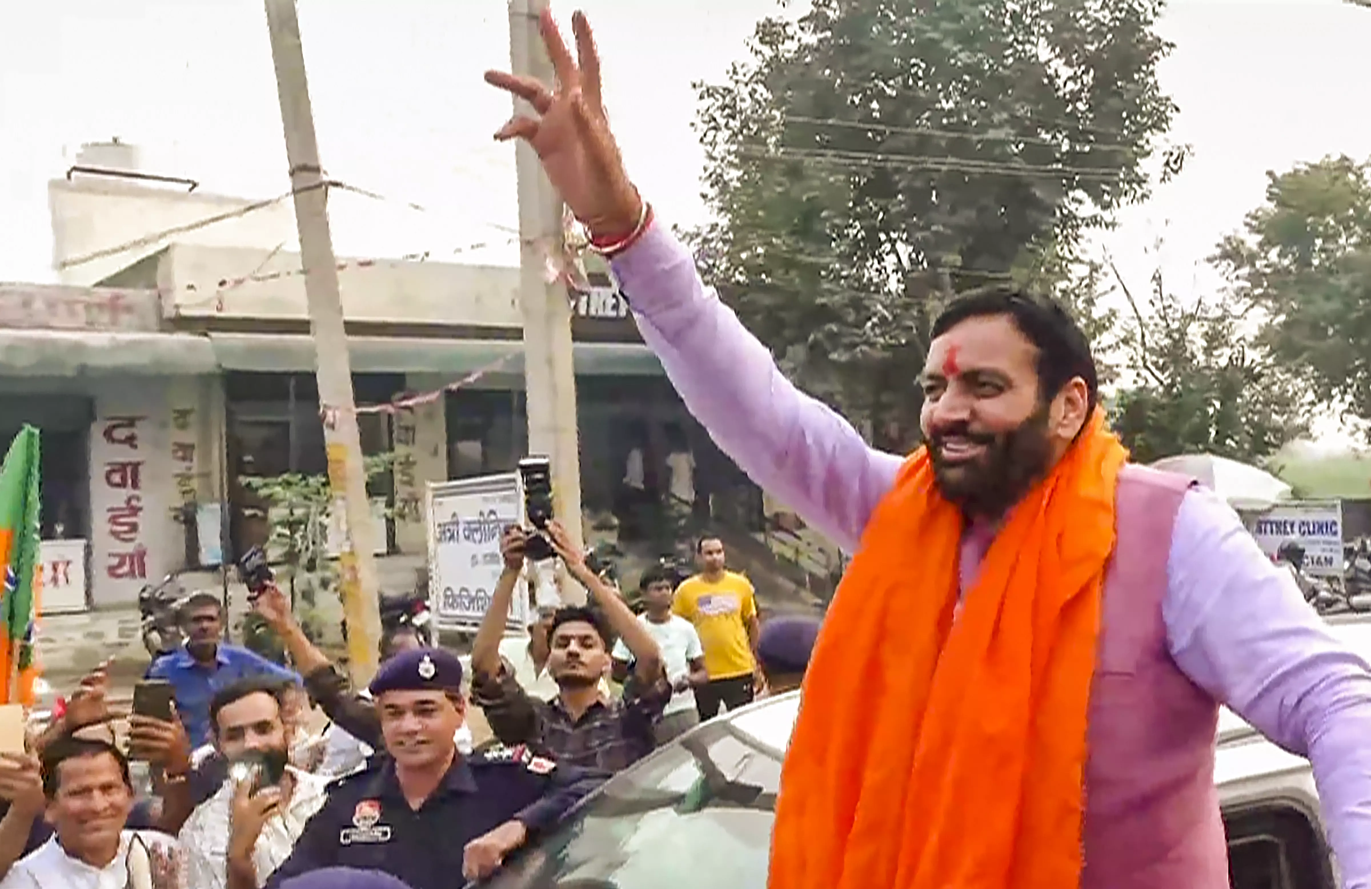 BJP candidate and Haryana Chief Minister Nayab Singh Saini celebrates with supporters after his victory from Ladwa constituency in the Haryana Assembly elections, on Tuesday, October 8. PTI