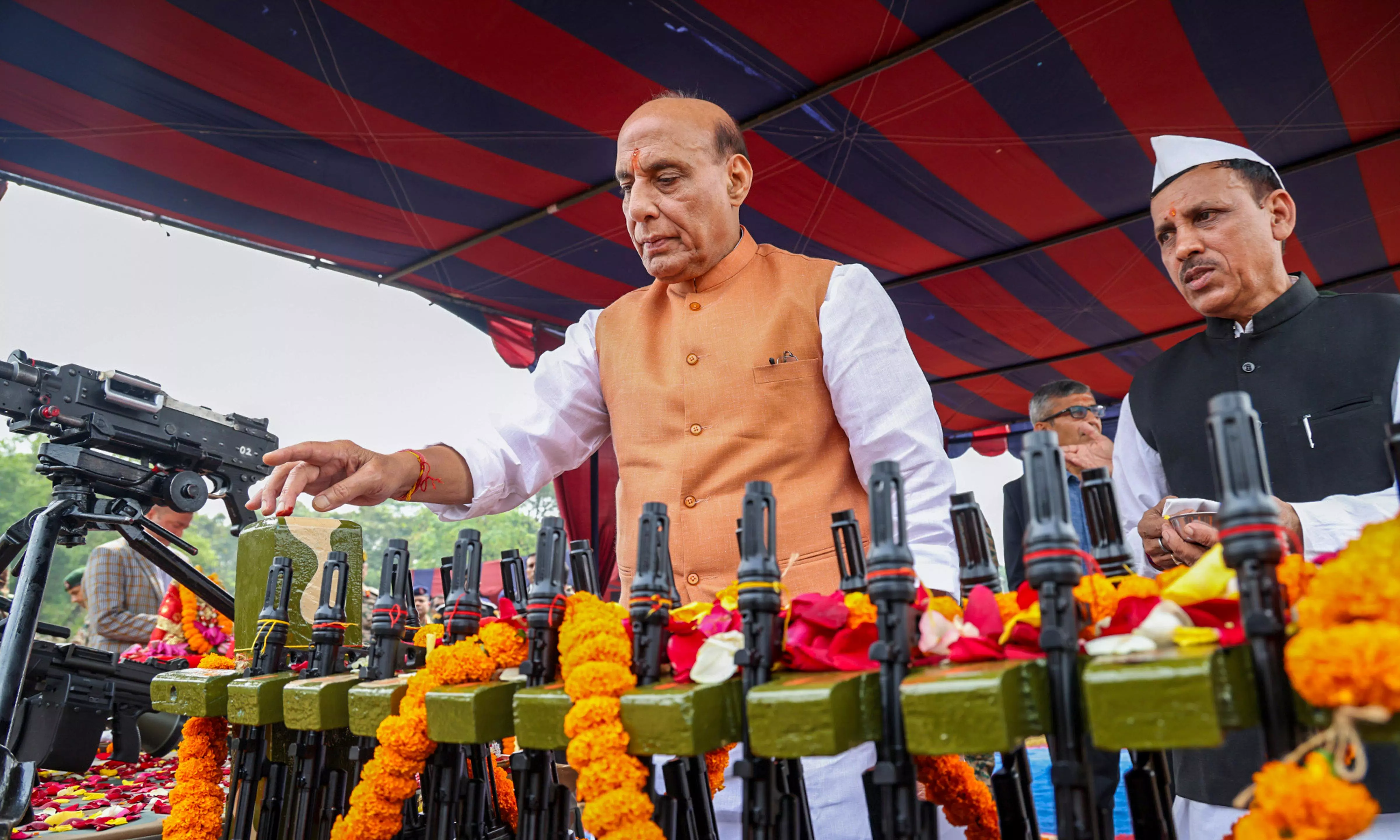 Shastra Puja signals weapons will be used with full force if needed: Rajnath