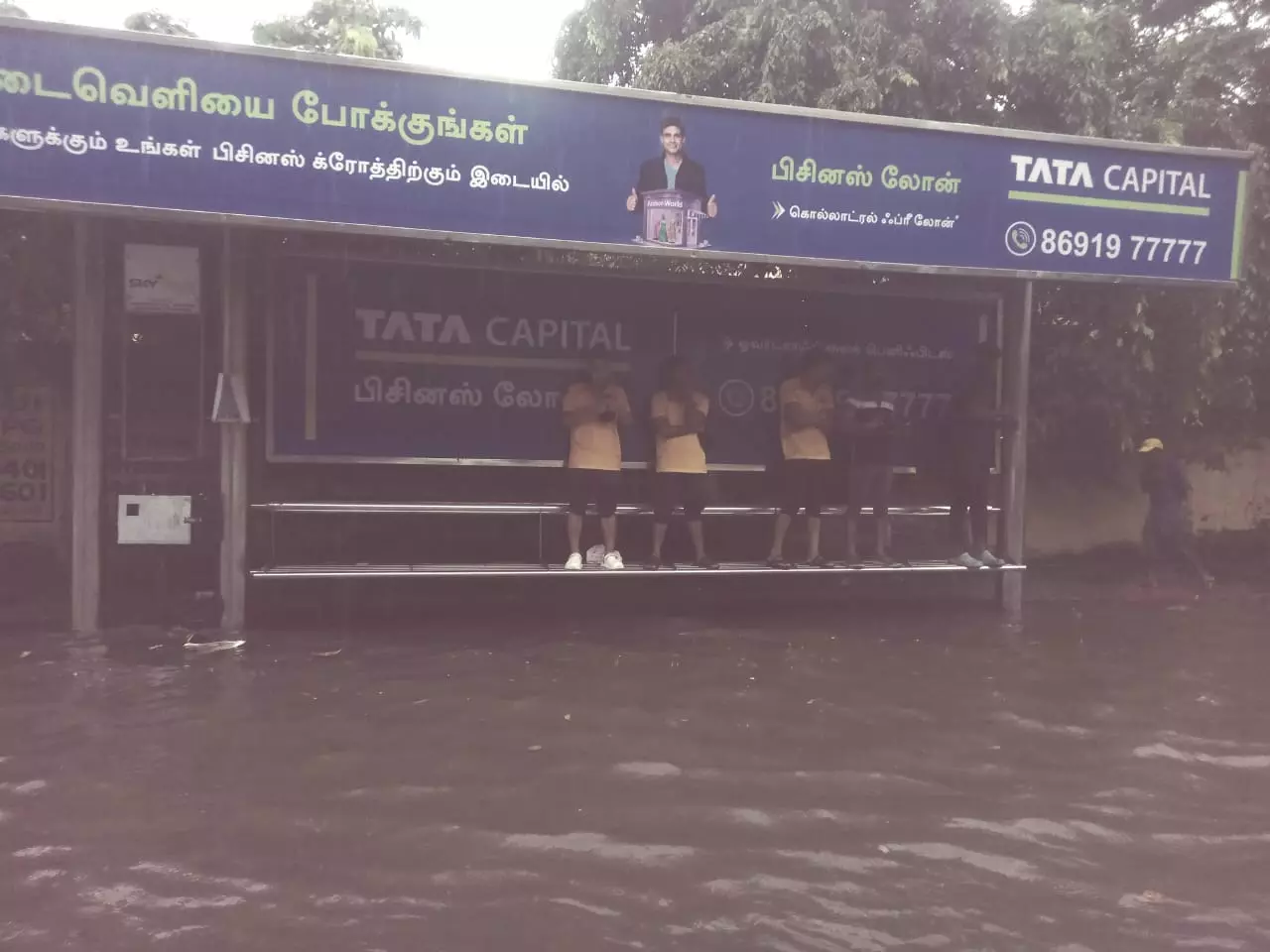 Food delivery agents wait for orders at IT corridor road