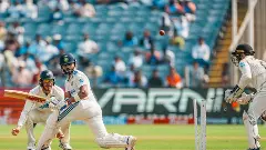 Indias Virat Kohli is bowled by New Zealands Mitchell Santner