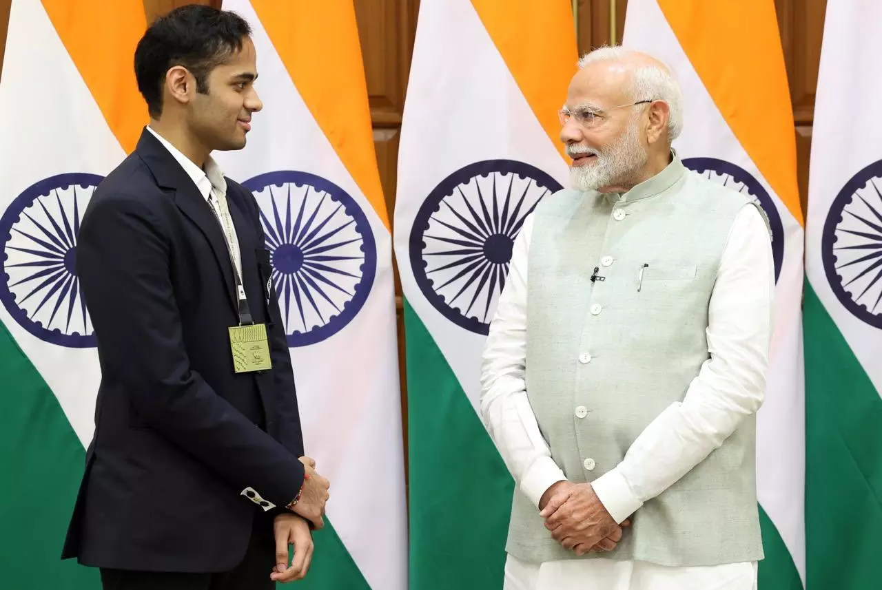 Indian chess player Arjun Erigaisi with PM Narendra Modi