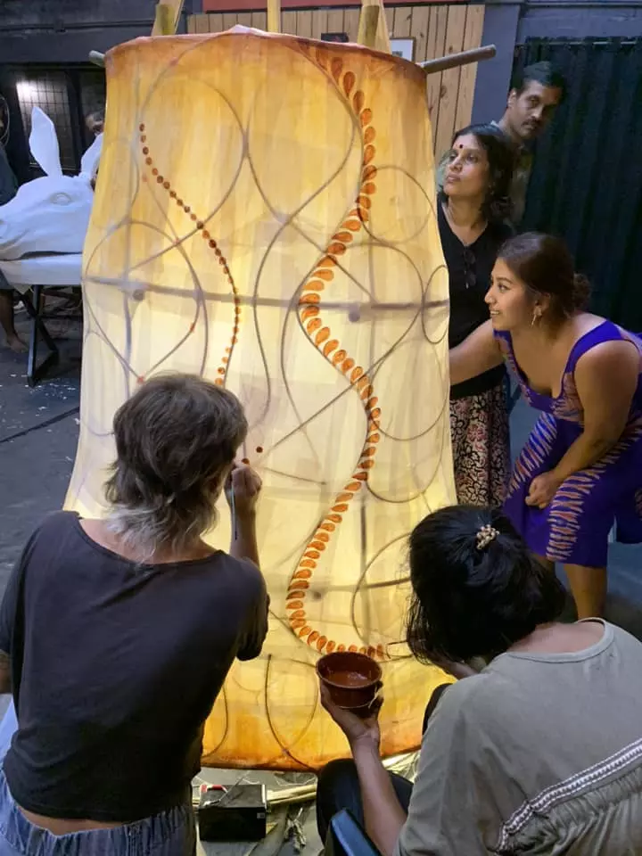 Artists make a lantern puppet