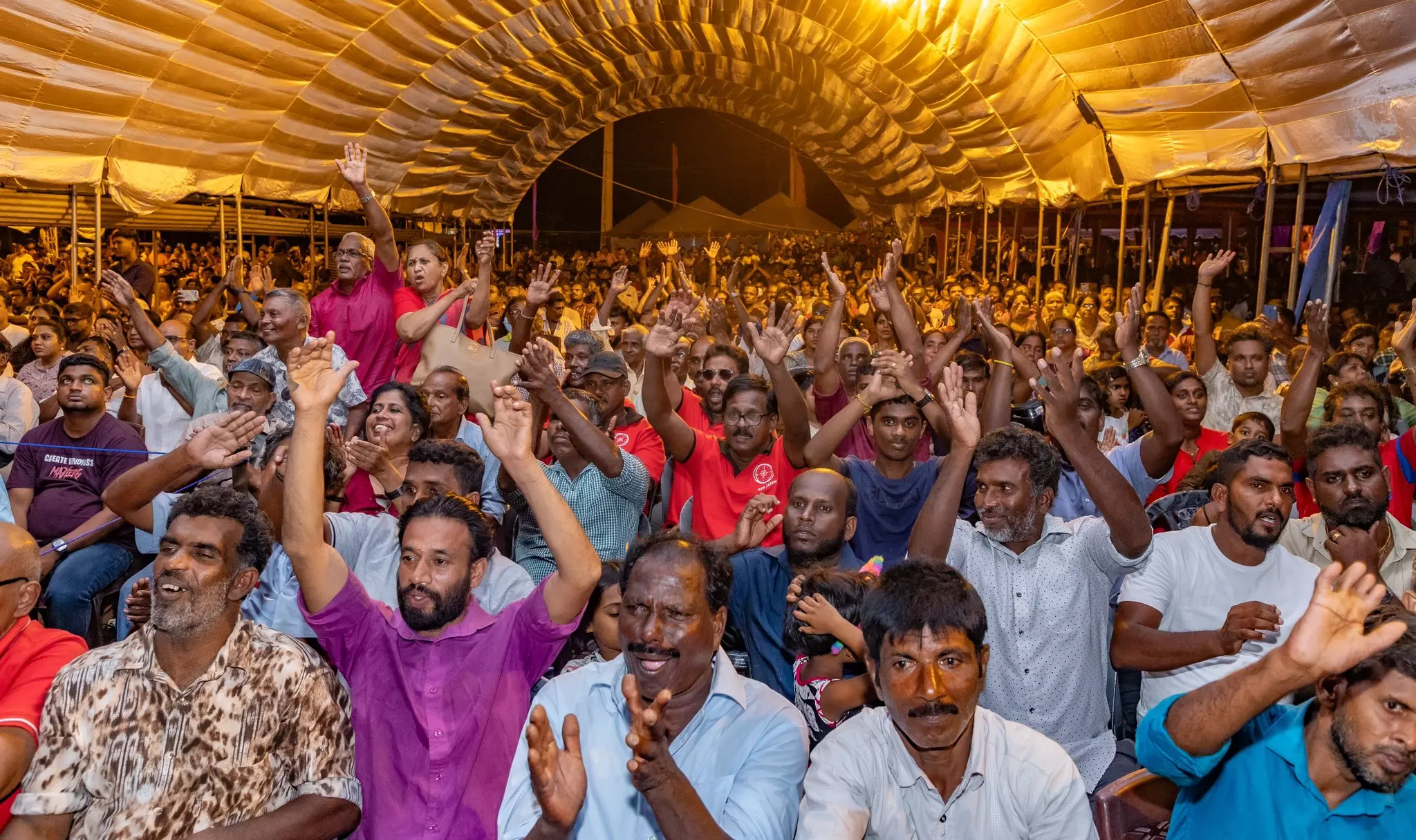 Sri Lankans attend a NPP poll rally in Jaffna