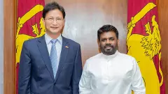 Qi Zhenhong and Disanayake