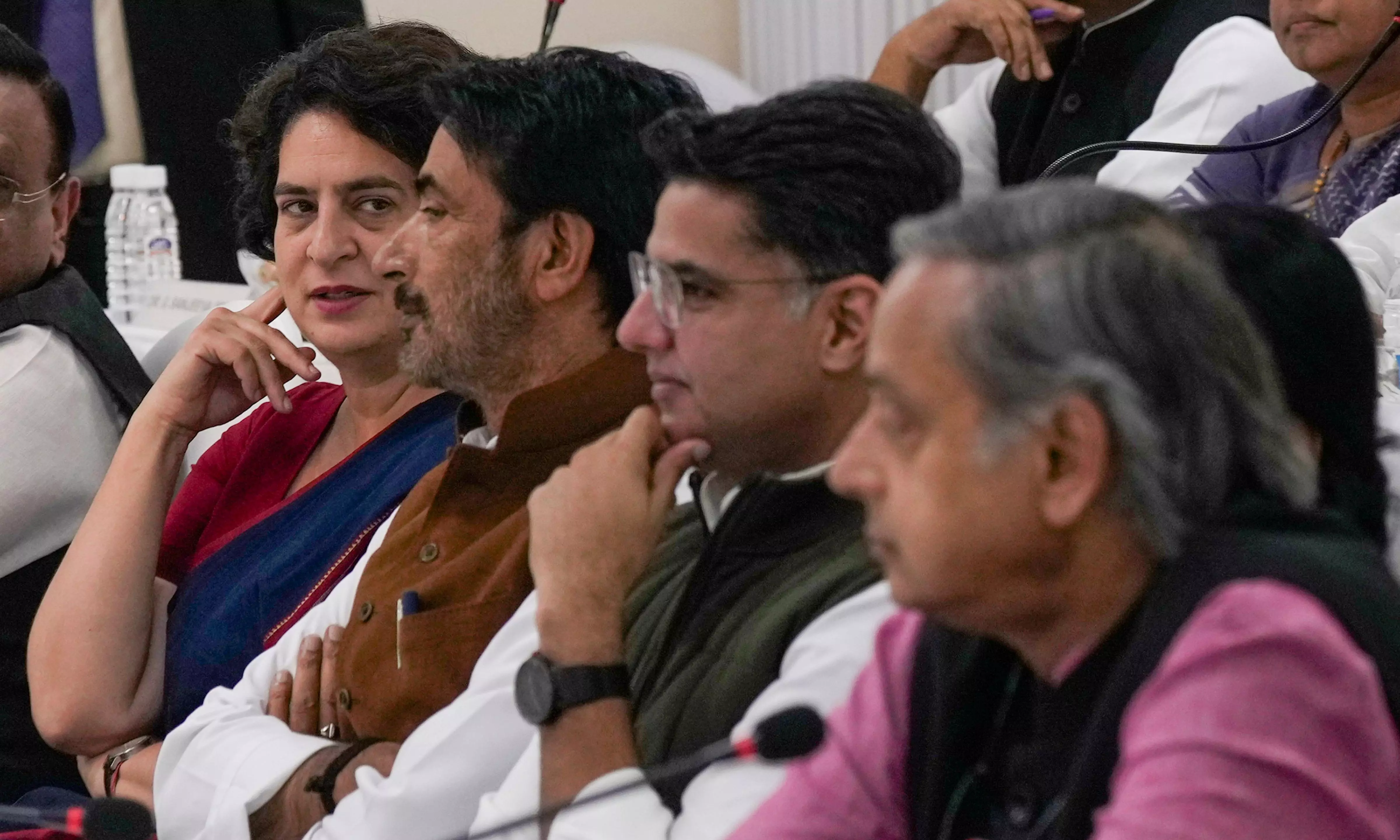 Congress leaders Priyanka Gandhi Vadra, Ghulam Ahmad Mir, Sachin Pilot, and Shashi Tharoor at the CWC meeting