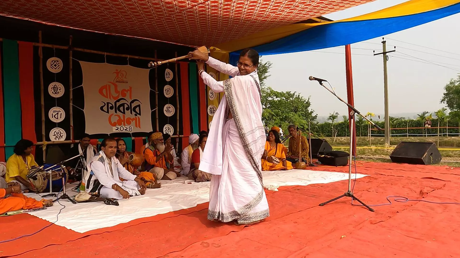 An artist performs at the Baul-Fakir mela.