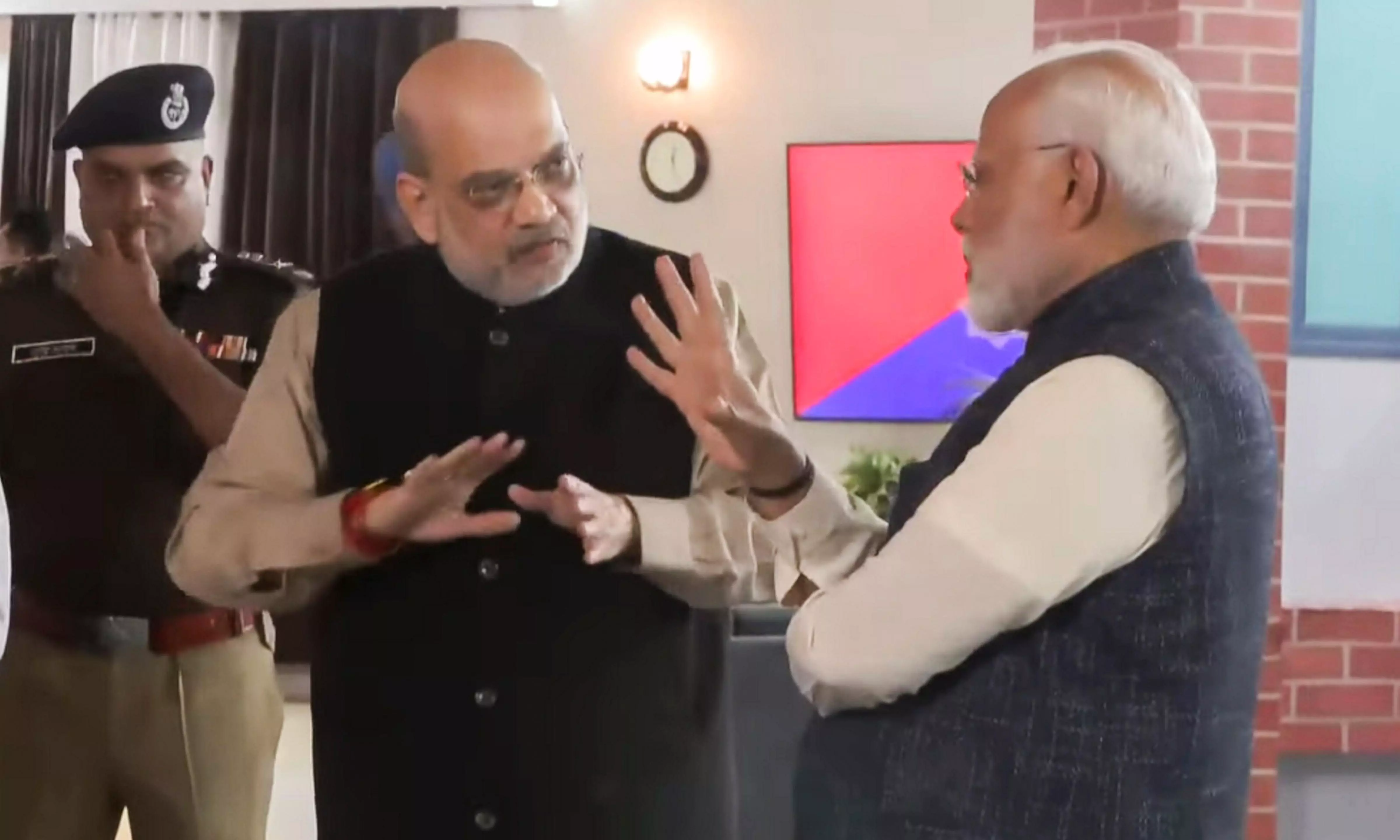 Prime Minister Narendra Modi with Union Home Minister Amit Shah at a ceremony to dedicate to the nation the implementation of three new criminal laws, in Chandigarh, Tuesday, December 3, 2024. (PTI Photo)