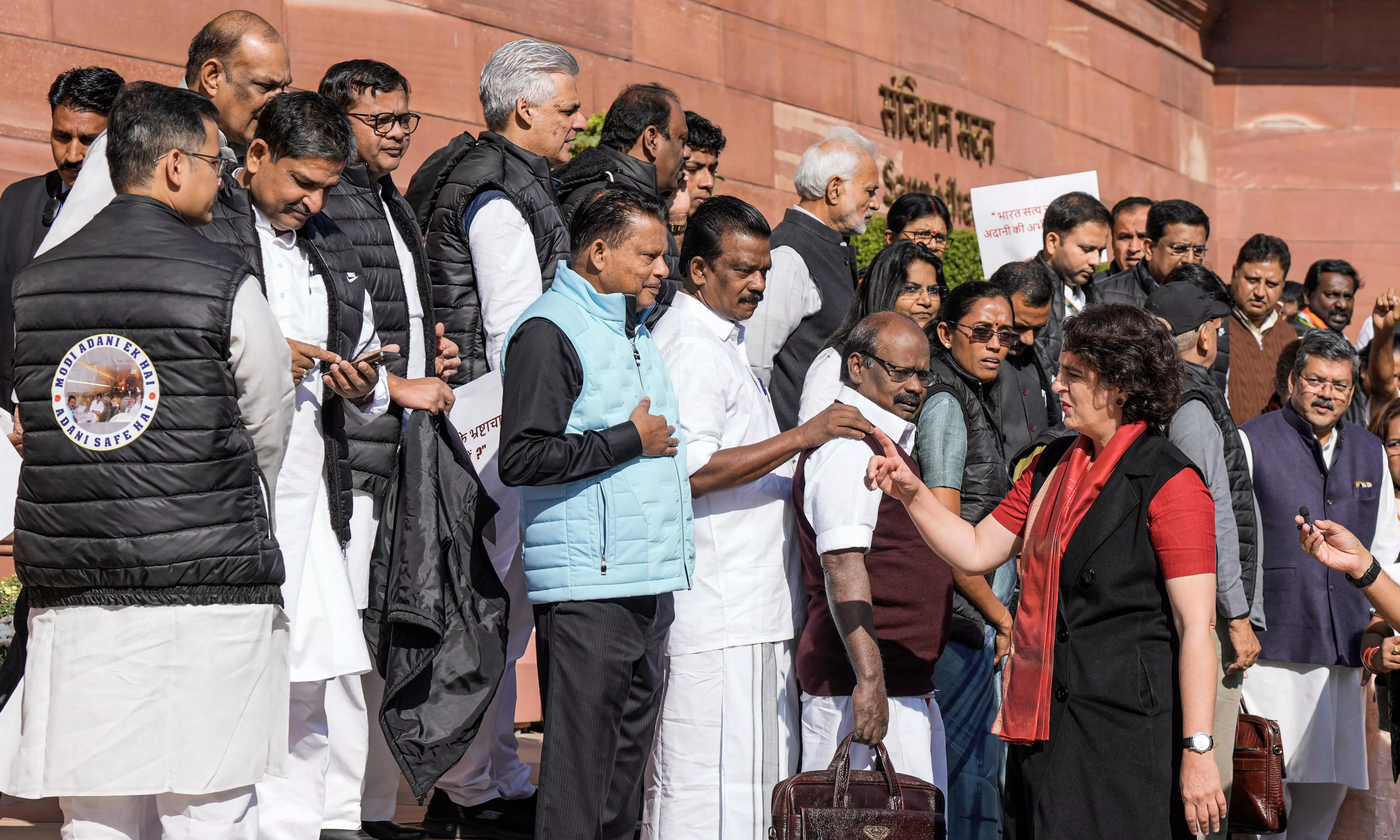 Opposition MPs don ‘Modi Adani Ek Hai’ jackets to protest outside Parliament