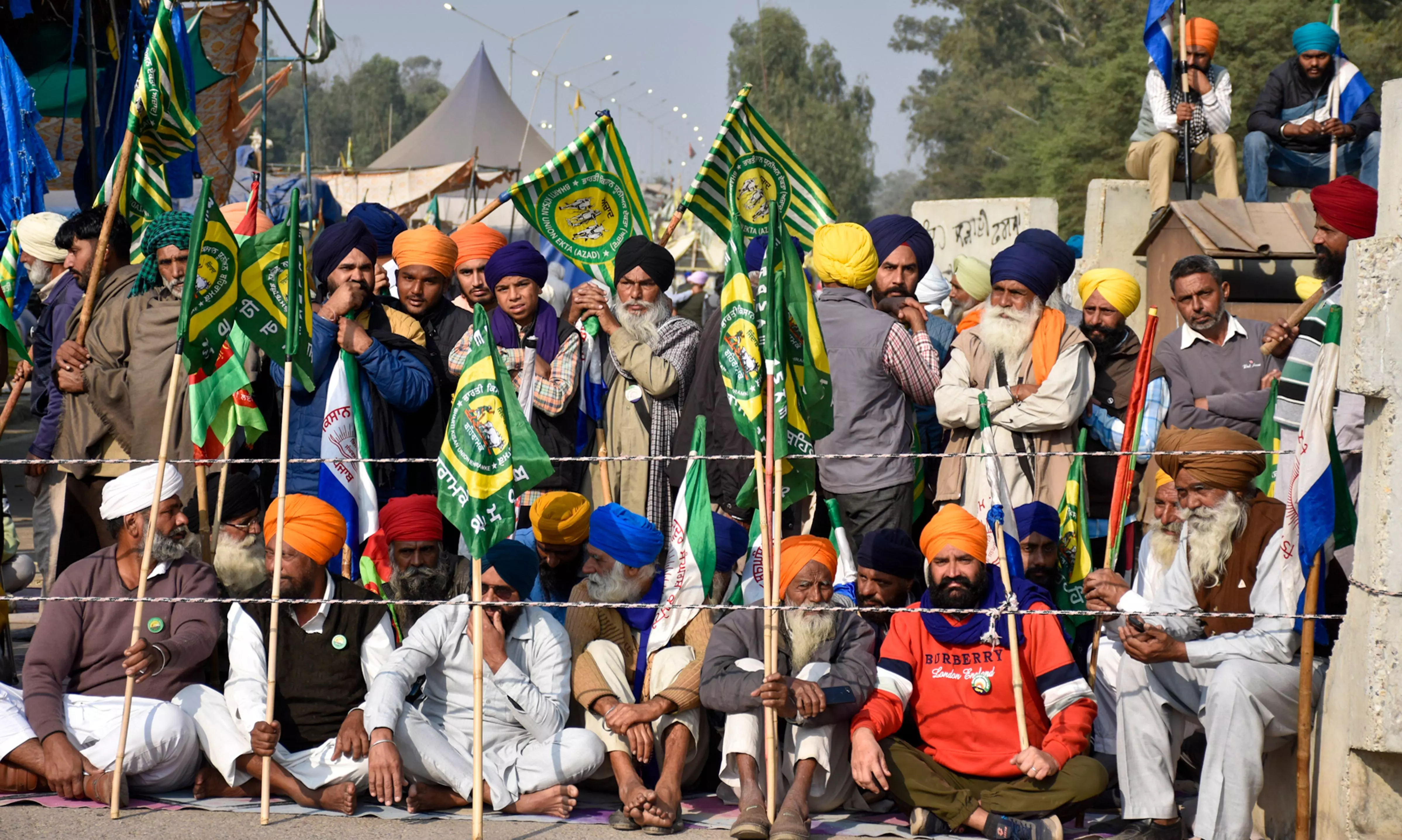 Farmers gather at the protest site on the Shambhu border in Punjabs Patiala district before the start of their march towards Delhi, Sunday, Dec. 8, 2024. PTI Photo