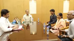 D Gukesh and his parents