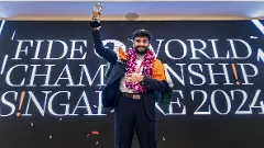 Gukesh gets his trophy, revels in stardom