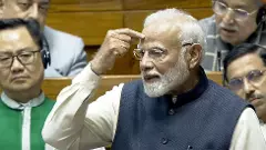 Prime Minister Narendra Modi speaks in the Lok Sabha, during a discussion on the Constitution.