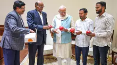 Sharad Pawar meets PM Modi with two Maharashtra farmers