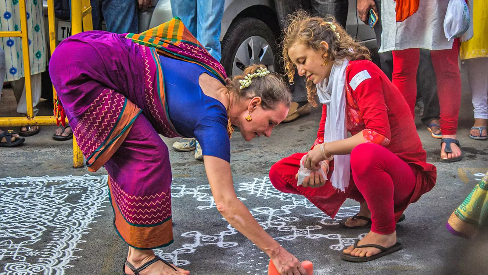 Foreigners participating in kolam festivities. Photos: Facebook/Mylapore Festival