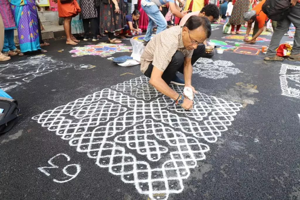 A male contestant at the Mylapore kolam contest. Photo: Vincent D Souza