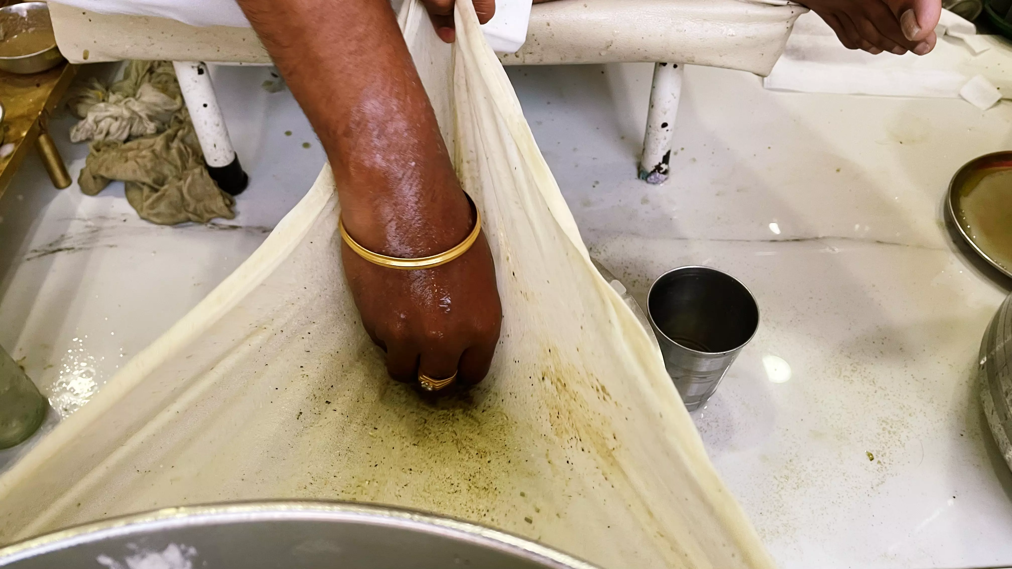 Bhang being processed for consumption.