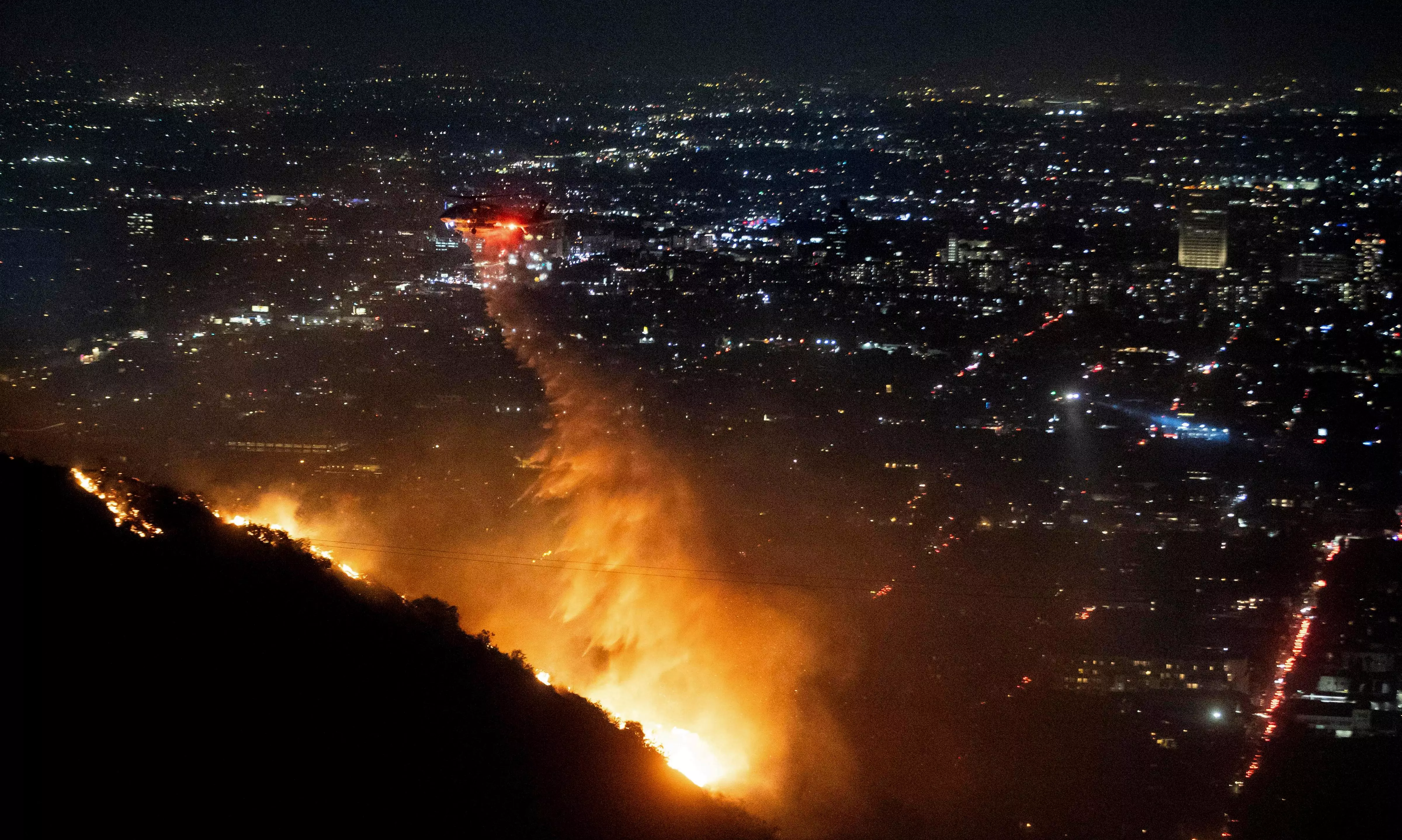 Los Angeles wildfire: 10 killed, homes ravaged; 20 arrested for looting