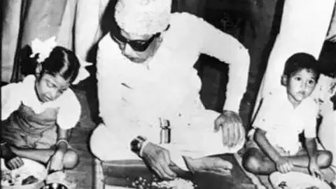 MGR having a meal with children