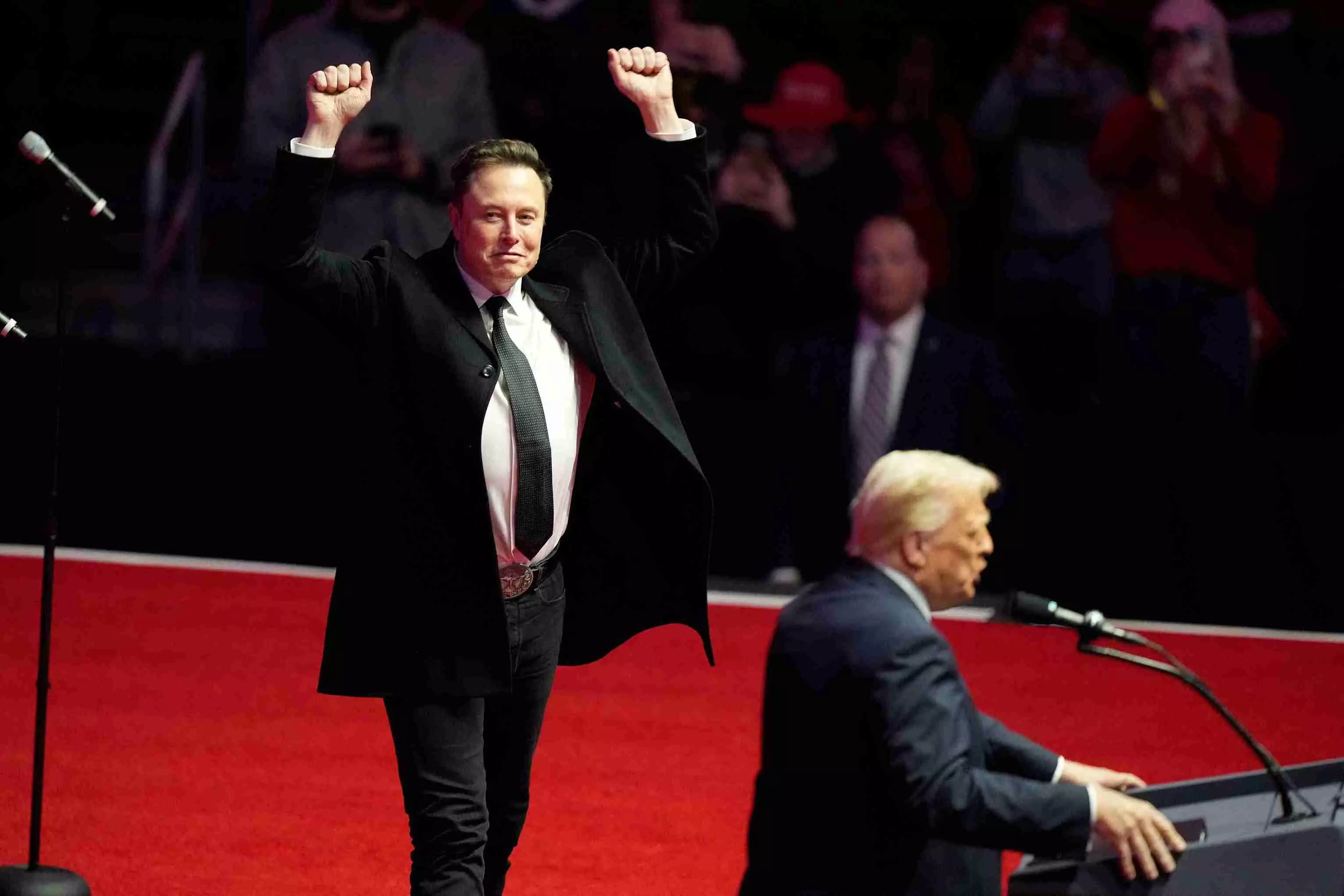 Elon Musk reacts as Donald Trump speaks at a rally ahead of the 60th Presidential Inauguration, on Sunday, in Washington | AP/PTI