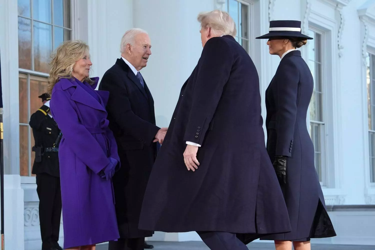 President-elect Donald Trump and Melania Trump are greeted by President Joe Biden and first lady Jill Biden, upon their arrival at the White House, Monday, Jan. 20, in Washington. AP/PTI