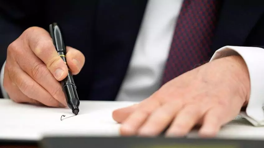 What executive orders did Donald Trump sign on Day 1 in office?