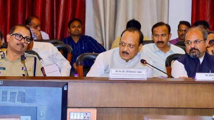 Ajit Pawar presiding over a meeting in Pune