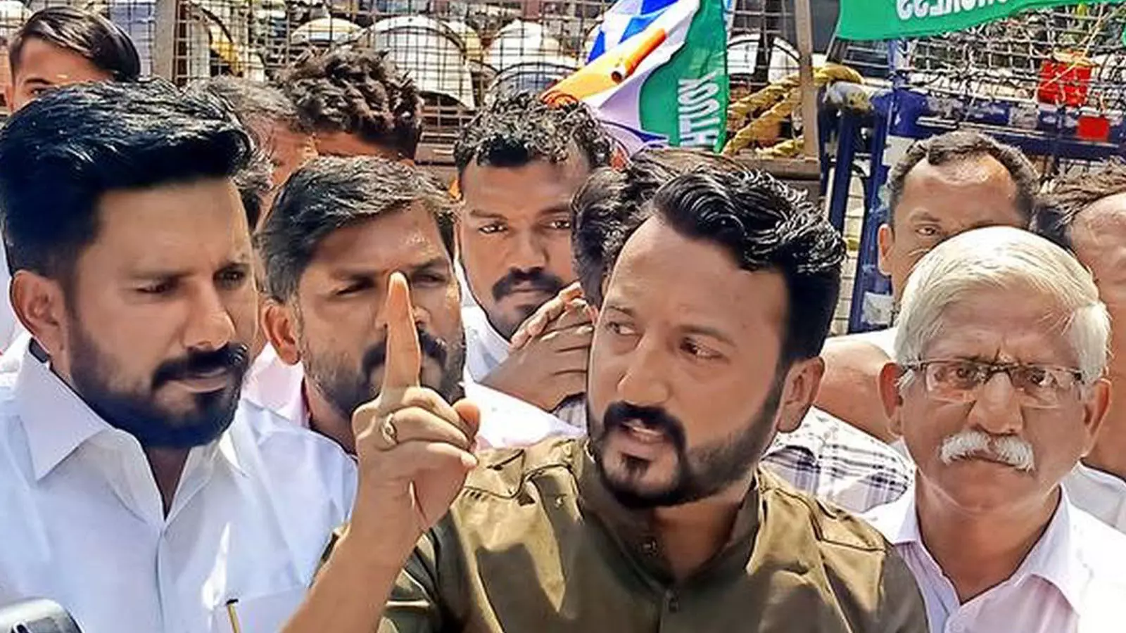 Rahul Mamkootathil, MLA, at a Youth Congress protest against police inaction in the Pothundi twin murder case at Nenmara. 