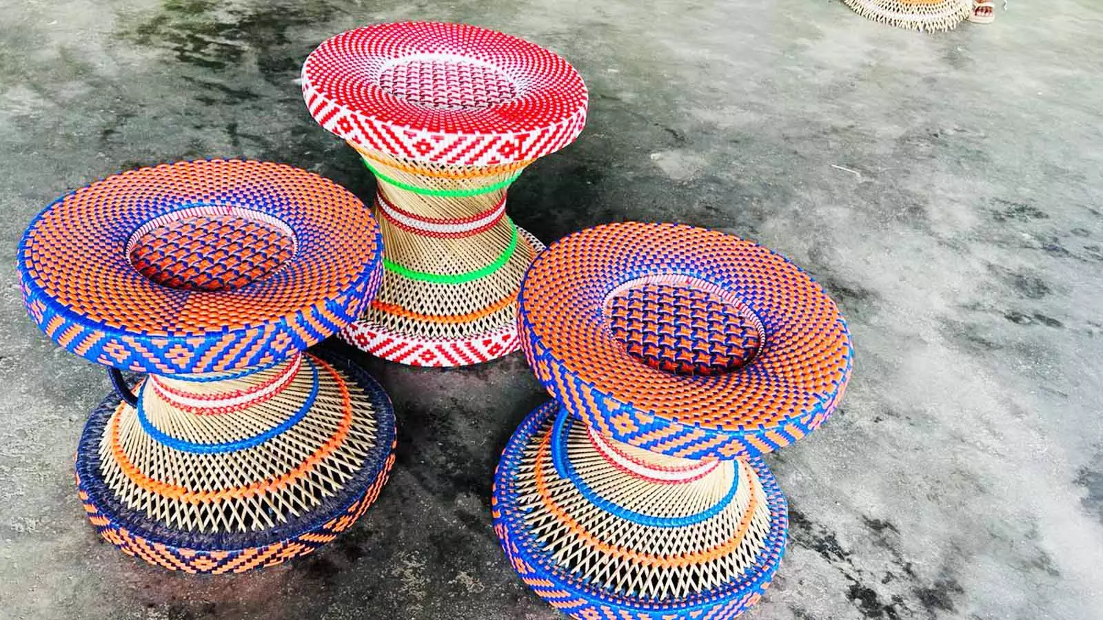 Assamese morahs, or sitting stools, made with bamboo and plastic, crafted by jail inmates of Tezpur.