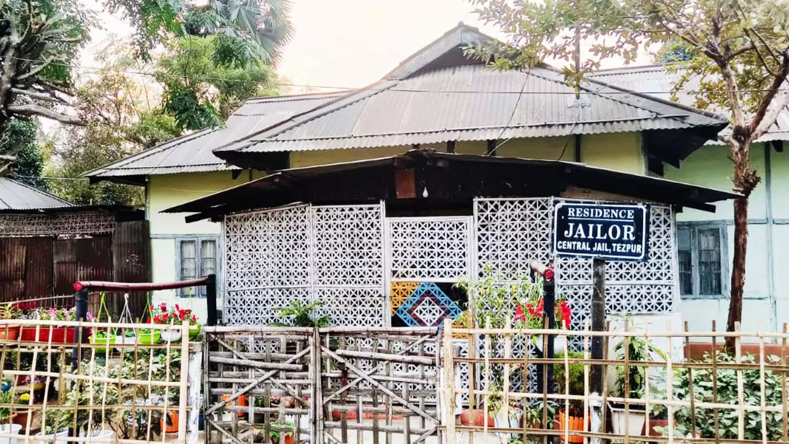 The Assam-type residence of the jailer. The potted flowering plants are its ornaments.