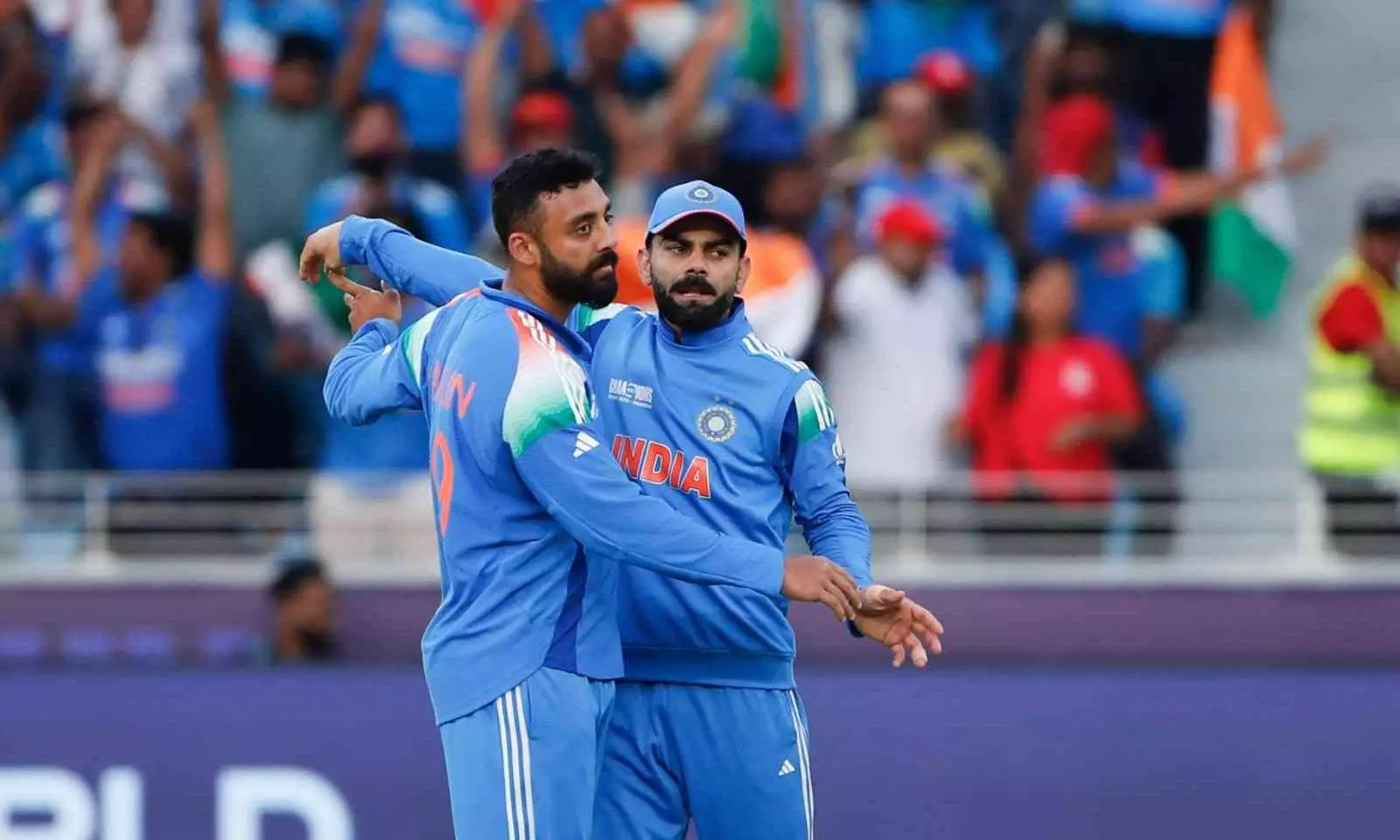 Varun Chakravarthy and Virat Kohli