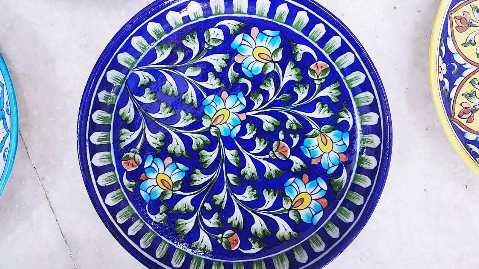 Persian blue pottery was introduced to India by Turkic artisans who accompanied invading armies pushing into the subcontinent.