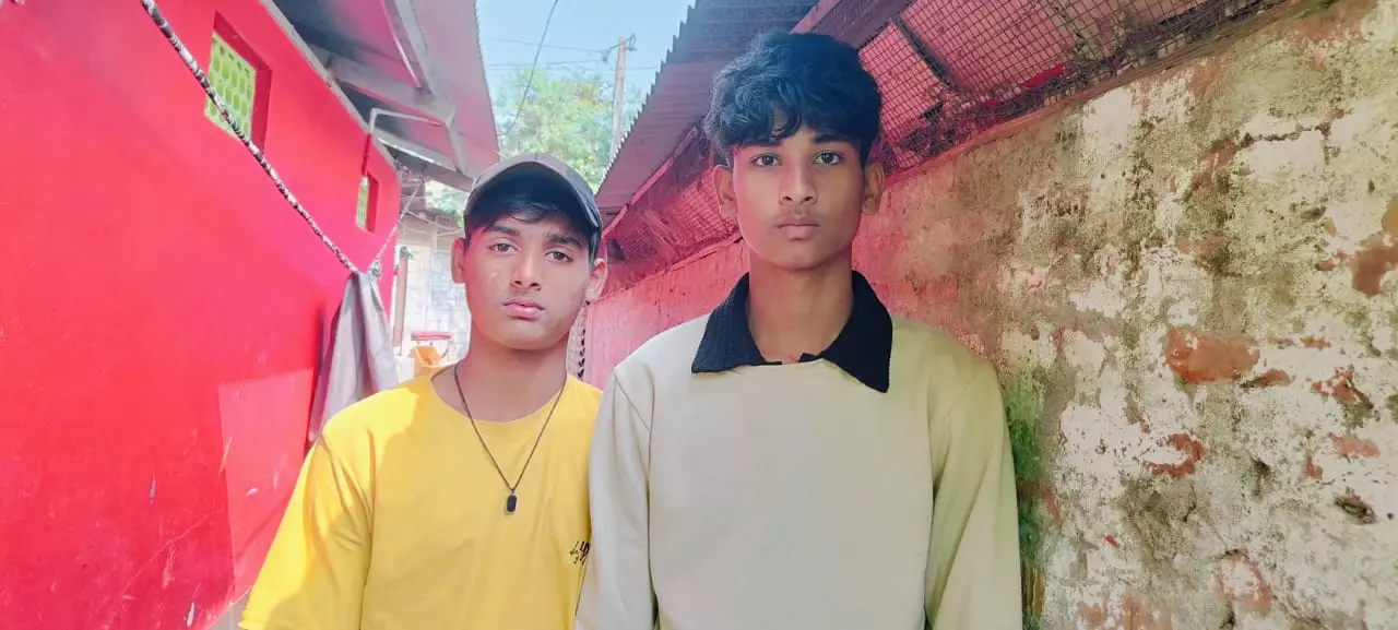 Anuj Basfore (right) and Angad Basfore (left), two talented cricket players from Tezpurs Harijan colony.