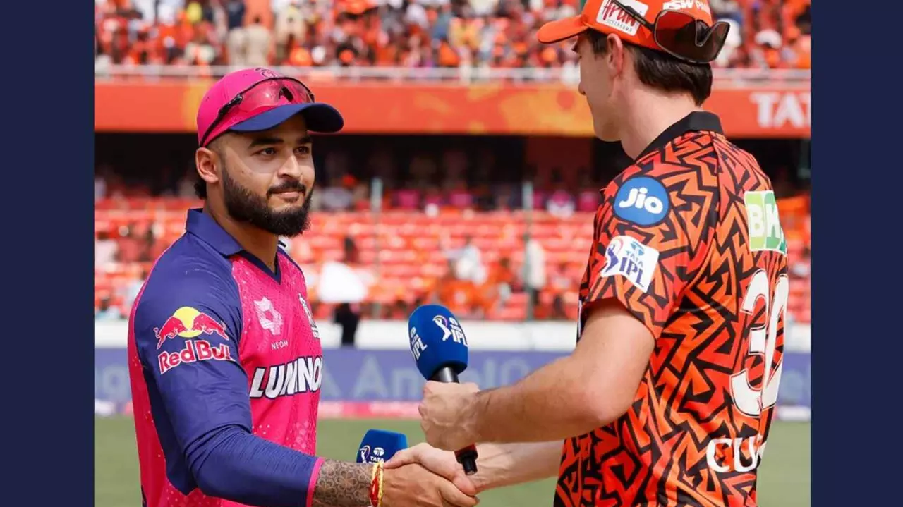 RR captain Riyan Parag (left) with SRH skipper Pat Cummins
