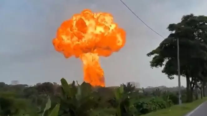 Malaysia gas pipe bursts, sparks fire