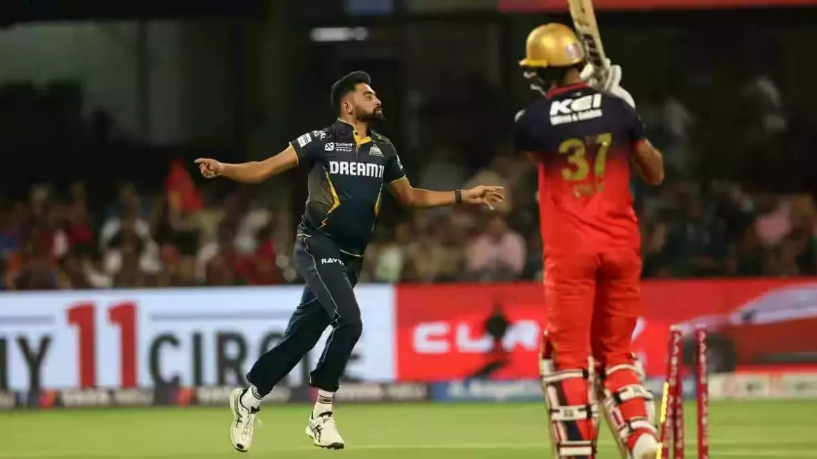 Gujarat Titans (GT) Mohammed Siraj celebrates after dismissing Devdutt Padikkal of Royal Challengers Bengaluru (RCB)