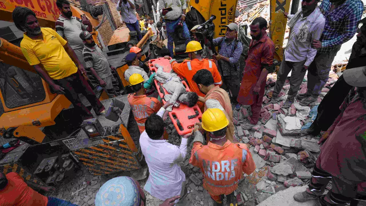 Toll in Delhi building collapse climbs to 11; blame on ground-floor construction work